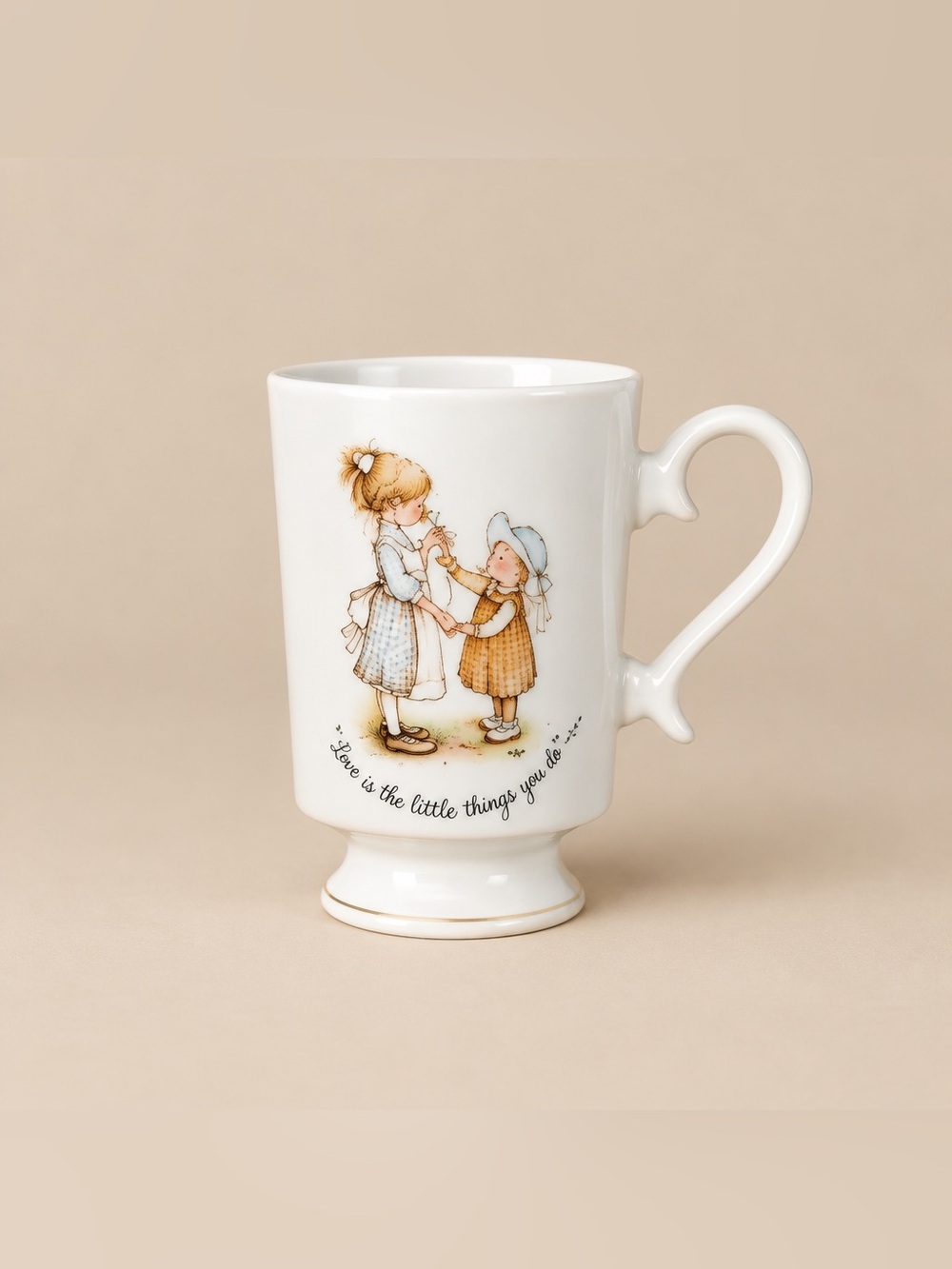1973 Holly Hobbie footed porcelain 8oz mug Love is the little things you do